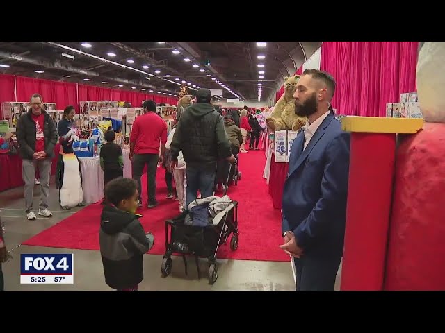 Families in need get presents during Christmas in The Park at Fair Park