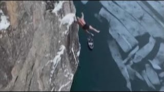Norvège : Il saute d'une falaise de 40.5 m de haut dans l'eau glacée et bas un record #sho