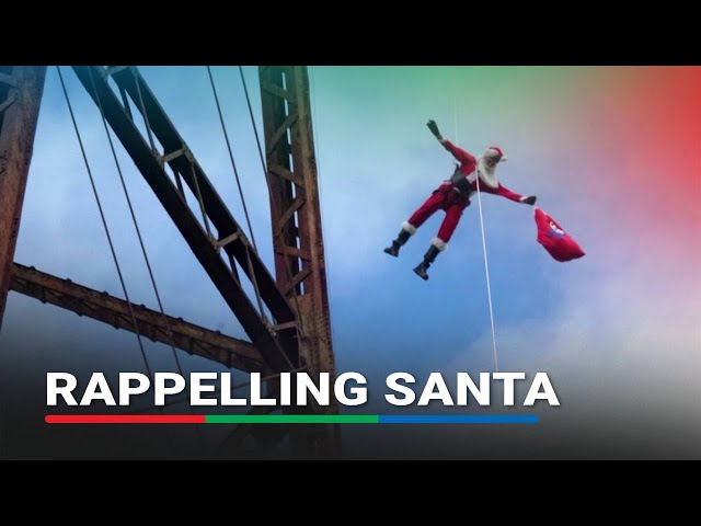 Santa rappels down to deliver gifts to Guatemalan children