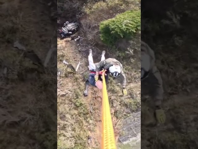 Rescuers airlift driver after car plunges off cliff #Shorts