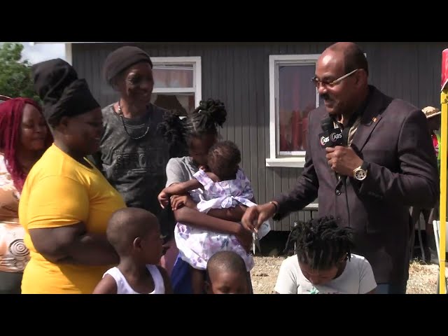 POINT FAMILY RECEIVES NEW HOME FROM GOVERNMENT