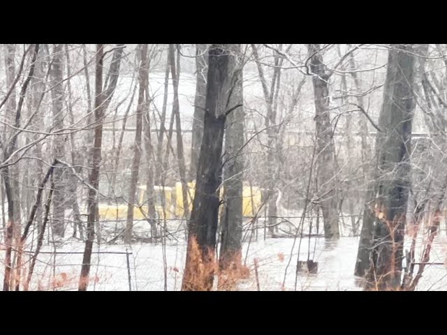 WATCH: Floodwaters send truck floating down New Hampshire river