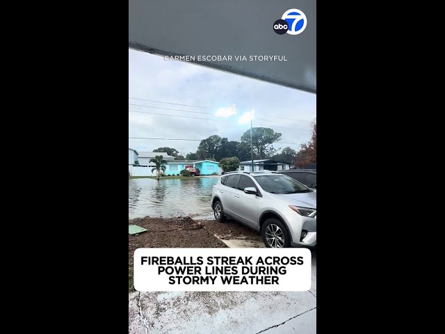 Fireballs streak across power lines during stormy weather