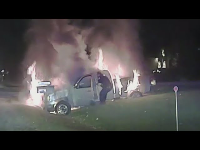 Dramatic rescue of driver from burning truck by Fraser police caught on video