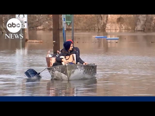 Floodwaters rising as East Coast recovers from deadly storm