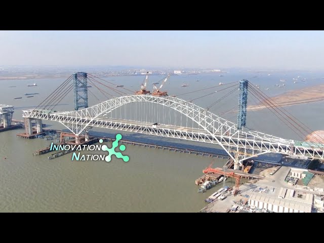 World's largest steel-trussed arch bridge combining highway, railway completes closure