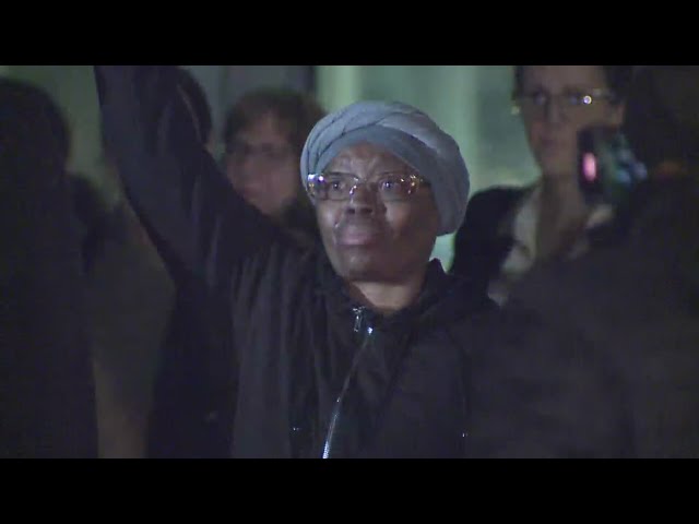 Sheneen McClain raises fist after paramedics convicted