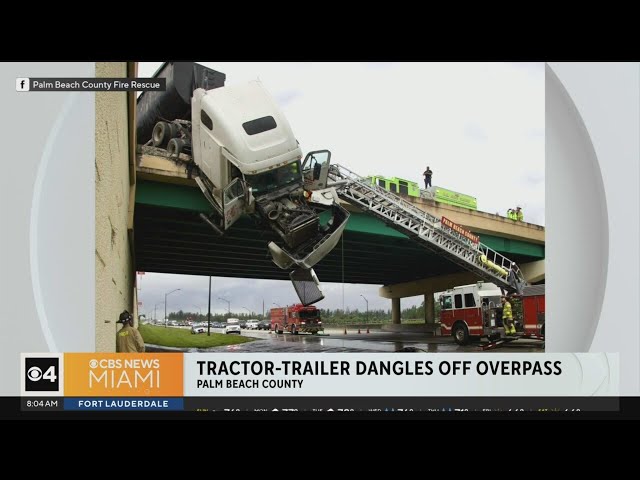 Tractor-trailer dangles off of Palm Beach County overpass