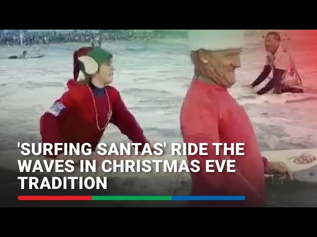 ⁣'Surfing Santas' ride the waves in Christmas Eve tradition