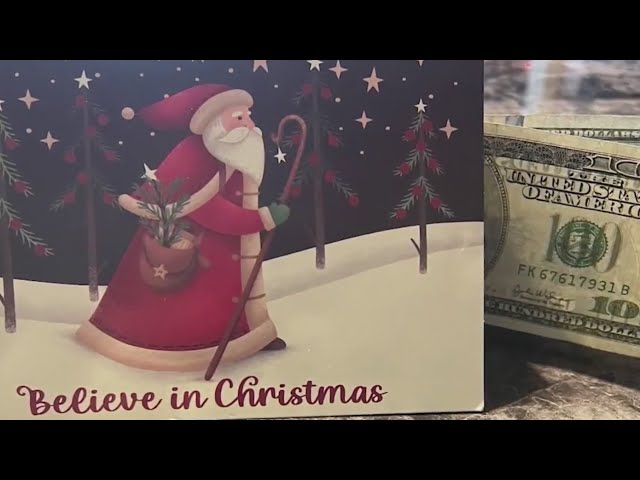 Local woman looking for owner of Christmas card with cash