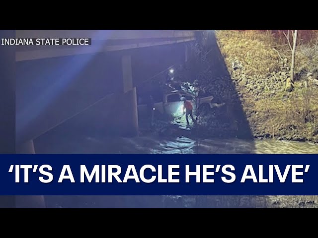 'It's a miracle he's alive': Man rescued after being trapped in vehicle for near