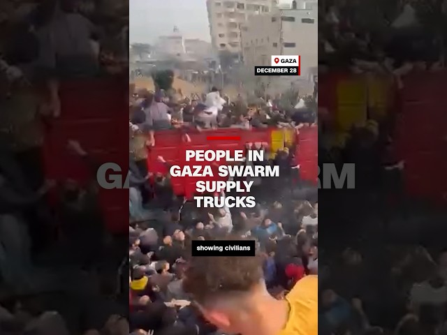 People in Gaza swarm supply trucks #cnn #news #gaza