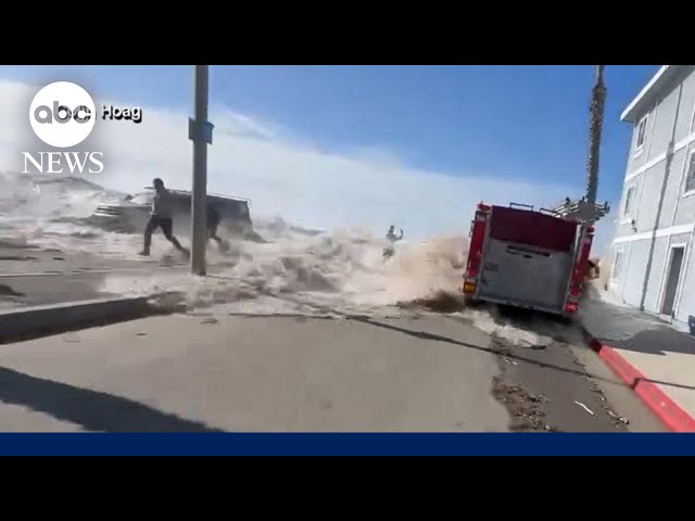 Massive wave sweeps people away, video shows