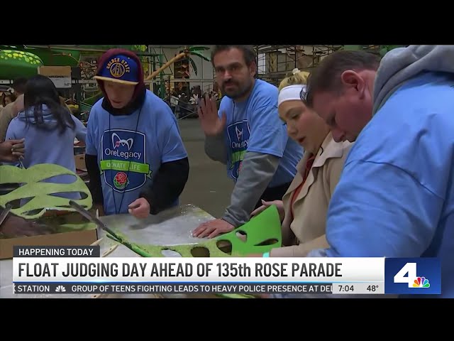 Volunteers add finishing touches to Rose Parade floats