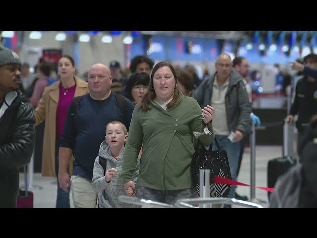 Michigan fans talk from Metro Airport