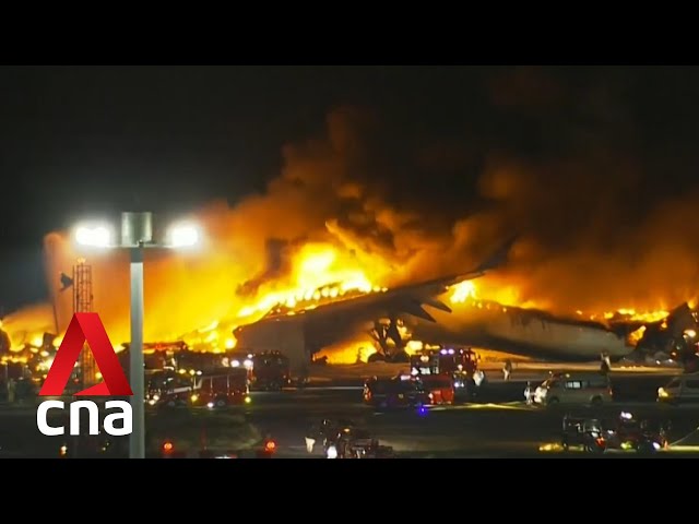 Japan Airlines plane on fire at Tokyo's Haneda Airport