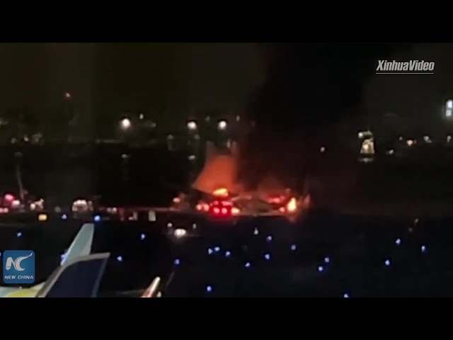 All 379 on board evacuated from aircraft in flames at Tokyo's Haneda Airport: NHK