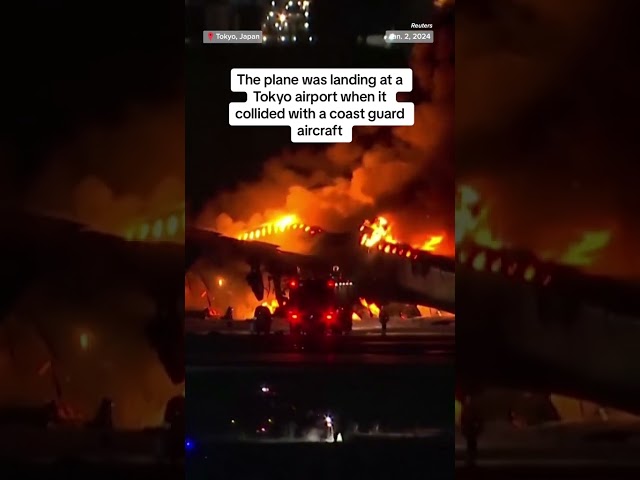 Hundreds of passengers escape burning plane in Japan