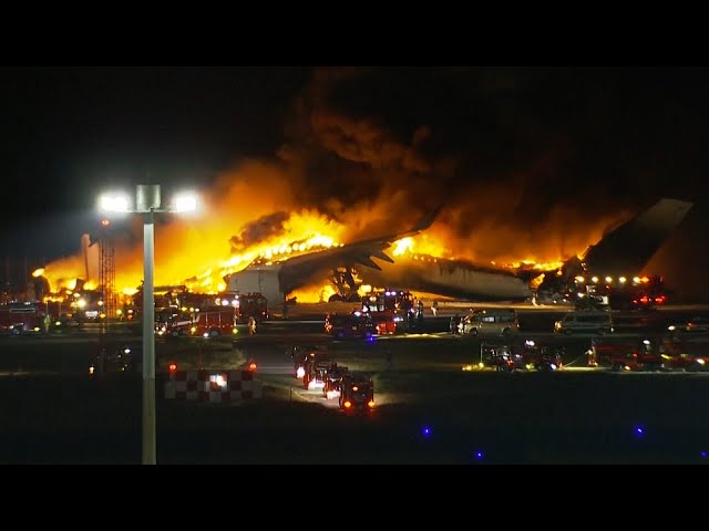 Fire erupts aboard Japan Airlines plane on runway, hundreds evacuated