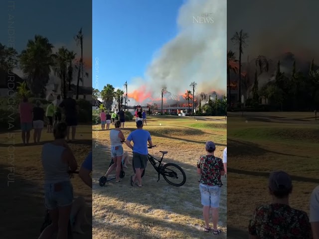 Guests look on as hotel is engulfed in flames in South Africa #shorts