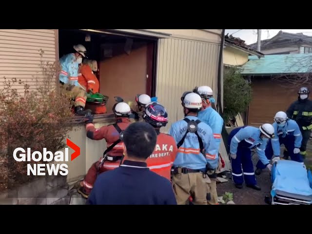 Japan earthquake: Woman rescued from collapsed home as race to find survivors continue