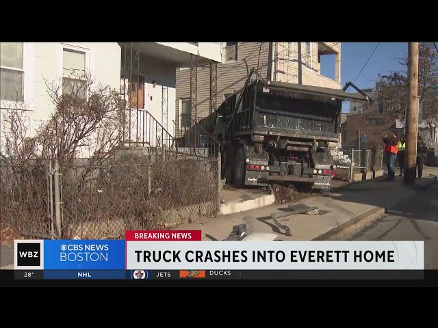 Everett home will need "severe work" after dump truck slams into it