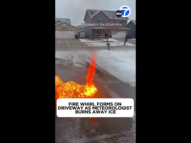 Fire whirl forms on driveway as meteorologist burns away ice