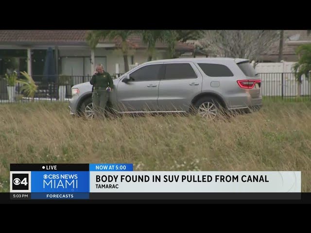 Broward Sheriff's Office seeks clues after body found in vehicle submerged in canal