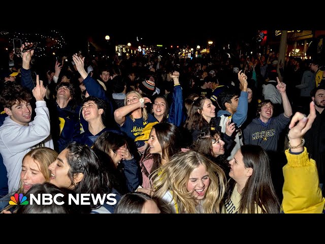 Michigan Wolverines fans celebrate after winning college football championship