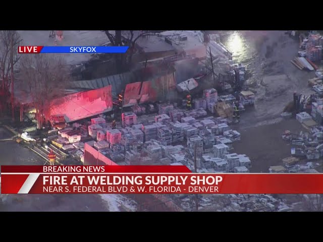 Crews battle fire at Denver welding supply shop