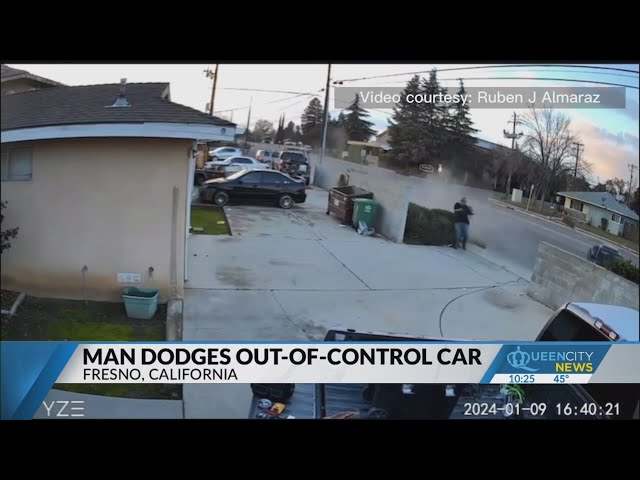 Man barely dodges car that plows over mailbox