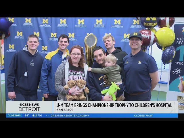 Michigan football team brings CFP National Championship trophy to Mott Children's Hospital