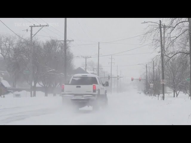 State of Iowa blanketed in snow and issued blizzard warning