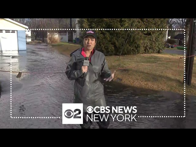 Little Falls, NJ homeowners using pumps to clear flooded streets