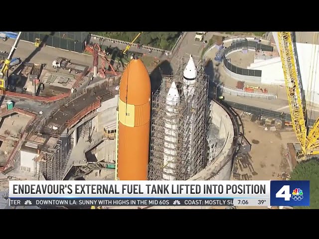 Endeavour's external fuel tank lifted into position