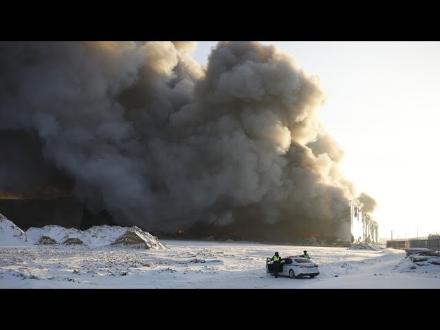 Huge fire engulfs warehouse in Russia