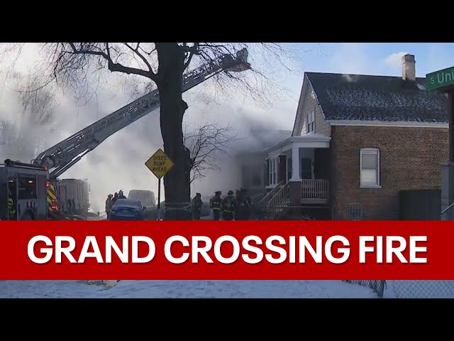 Chicago firefighters battle blaze at Grand Crossing home