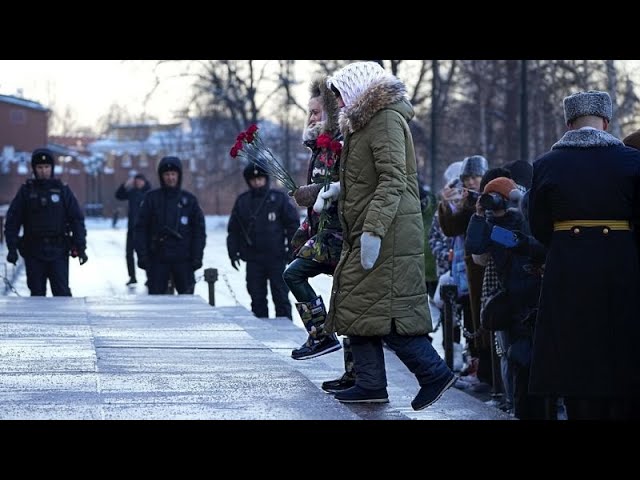 Wives of Russian soldiers lay flowers in Moscow to protest against the Kremlin