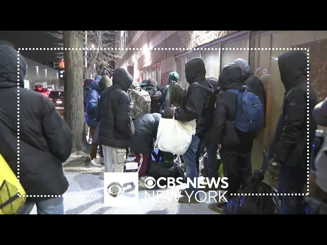 Asylum seekers evicted from New York City shelters wait in cold