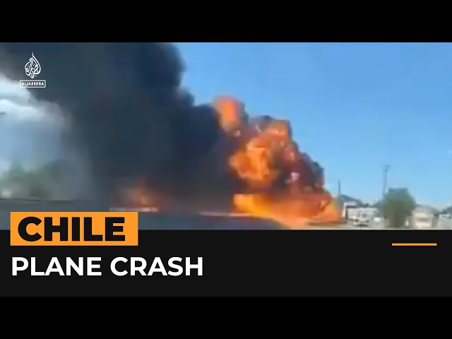 Plane crashes onto highway in Chile