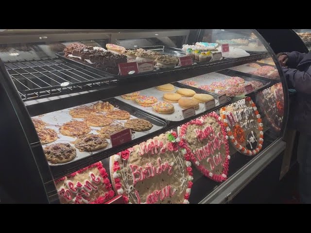 Woman slams 10-year-old's head into cookie display at Troy mall