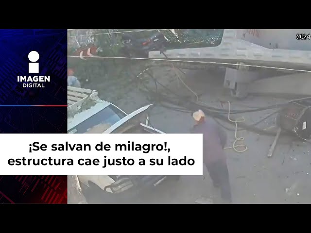 ¡Se salvan de milagro!, estructura de Tren México-Toluca cae justo a su lado