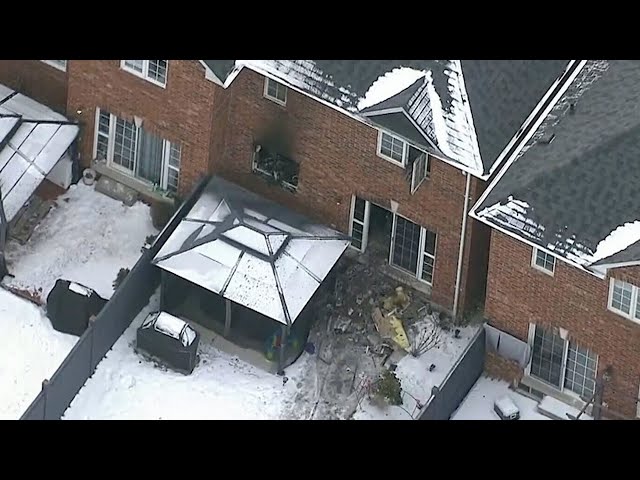 Mom throws child from second floor window to escape burning home