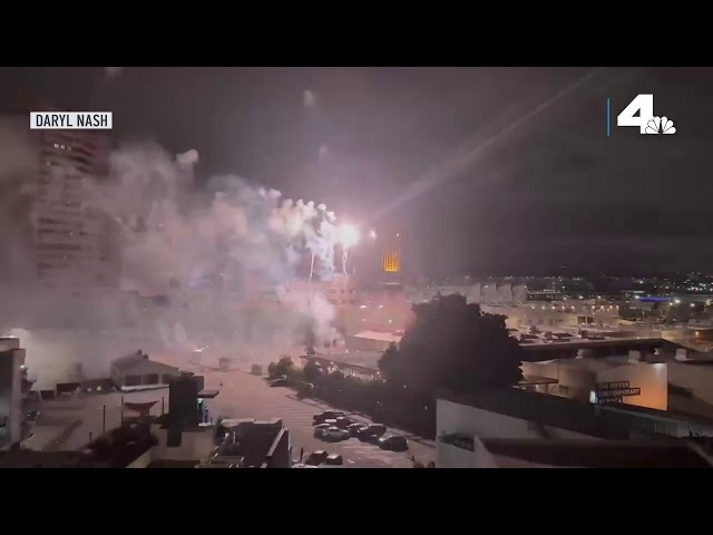 Illegal fireworks show glows over downtown LA