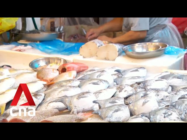 Rising cost of living dampening business for wet market stallholders amid festive CNY