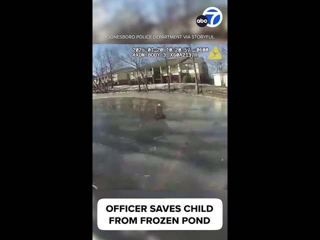 Video shows officer rescuing child who fell through frozen pond