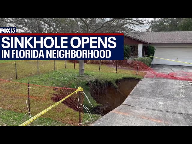 60-foot sinkhole opens up under Florida neighborhood