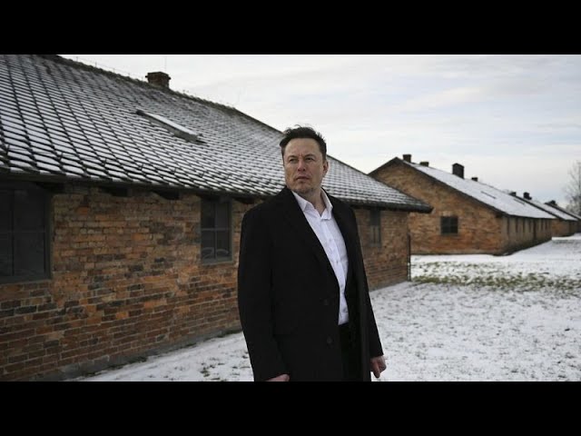 ⁣Elon Musk besucht Auschwitz
