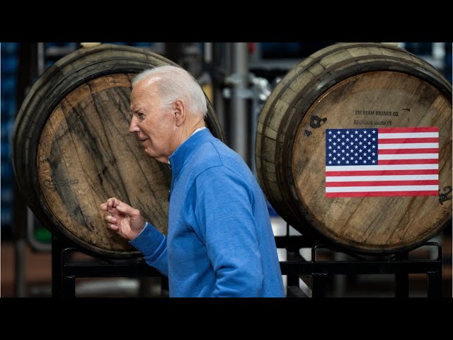 Joe Biden caught 'speaking a different language' and listening to barrel of beer