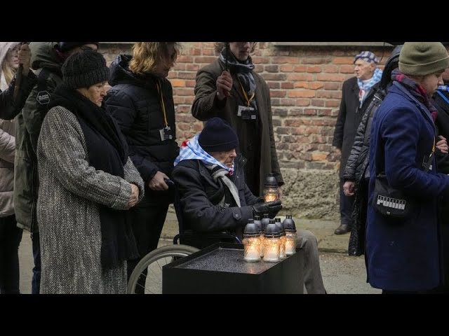 Survivors remember the victims of the Nazi death camps at Auschwitz